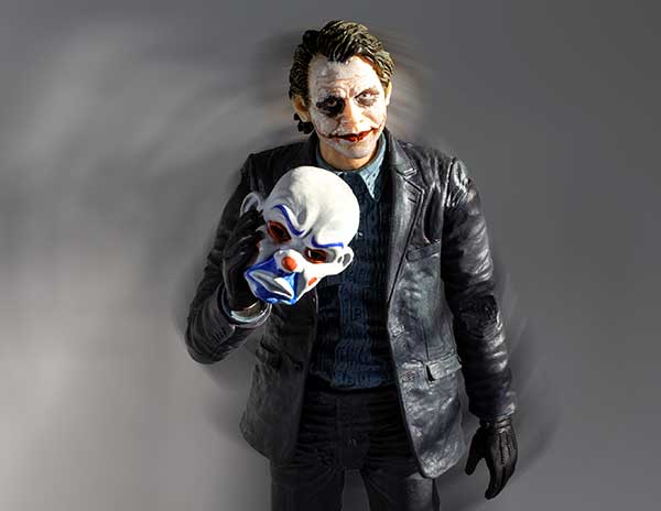 Joker removes Sad Clown Mask