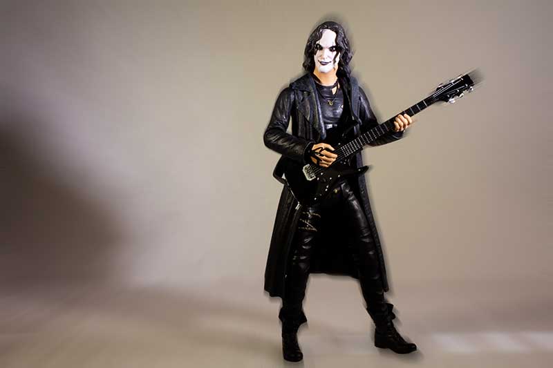 Draven action figure with guitar
